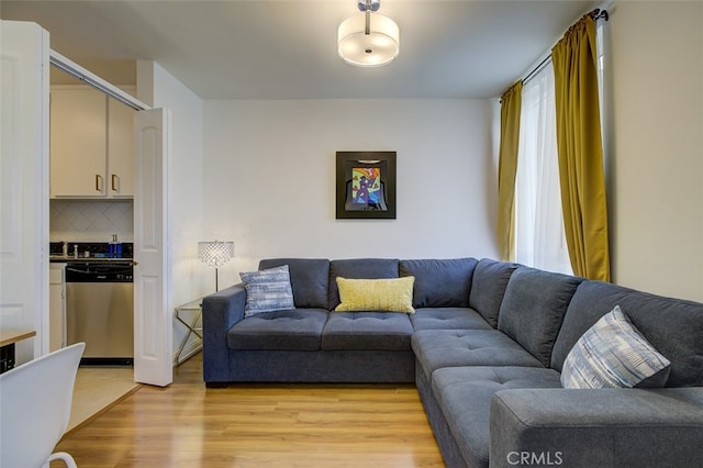 living area featuring light wood-style flooring