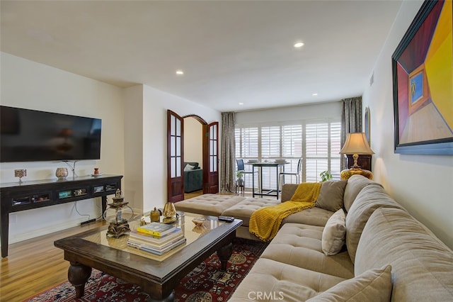 living area featuring recessed lighting and wood finished floors