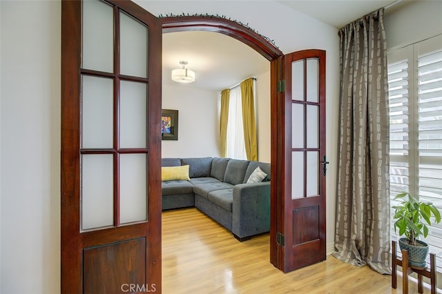 living room with light hardwood / wood-style floors