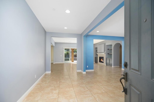 foyer entrance featuring light tile patterned flooring