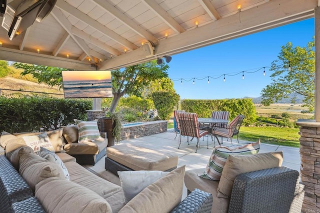 view of patio featuring a gazebo and outdoor lounge area