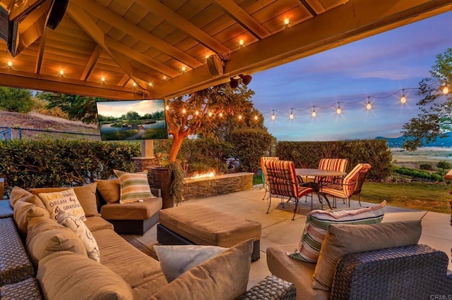 view of patio featuring a gazebo and an outdoor hangout area