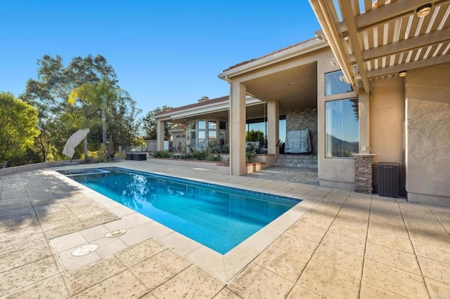 view of pool featuring a pergola and a patio