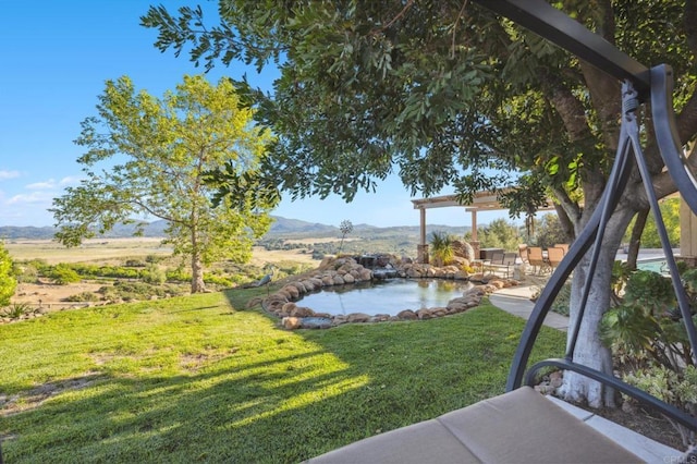 view of yard with a mountain view