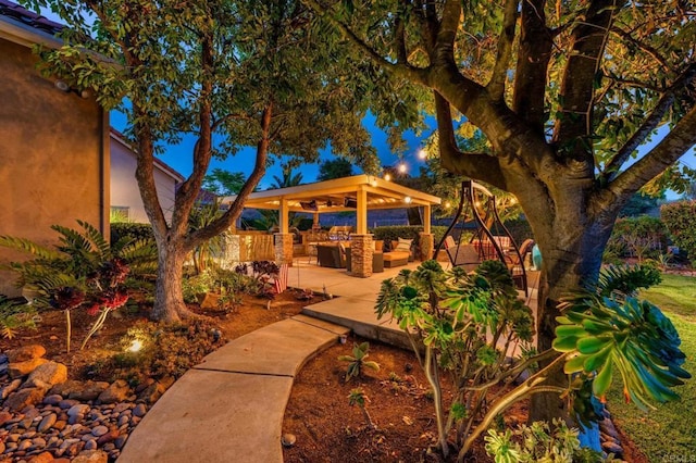 view of patio with a gazebo and fence