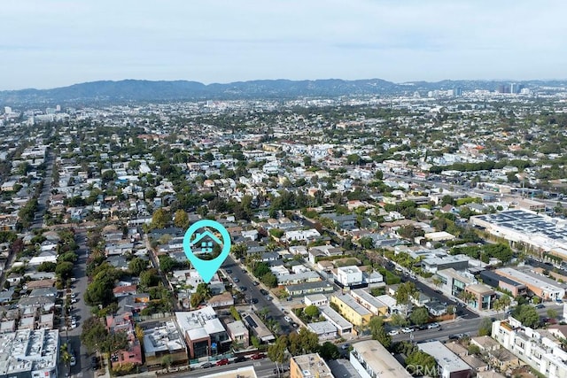 drone / aerial view featuring a mountain view