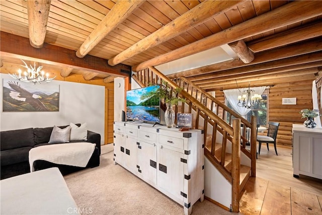 living room with beam ceiling, wooden ceiling, a notable chandelier, and light wood-type flooring