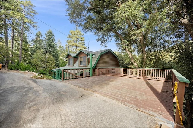 view of home's exterior featuring a deck