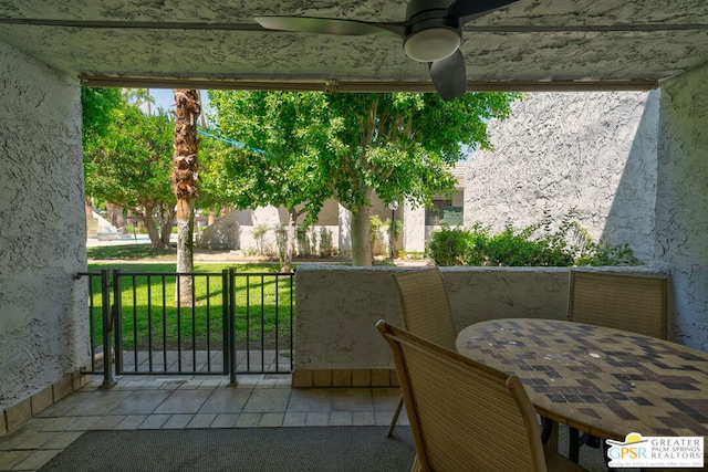 view of patio / terrace featuring ceiling fan