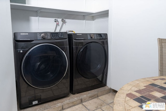 laundry area with washer and dryer