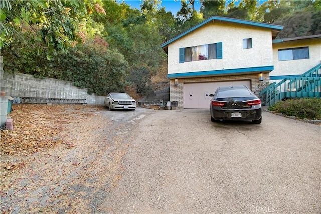 view of front of home with a garage