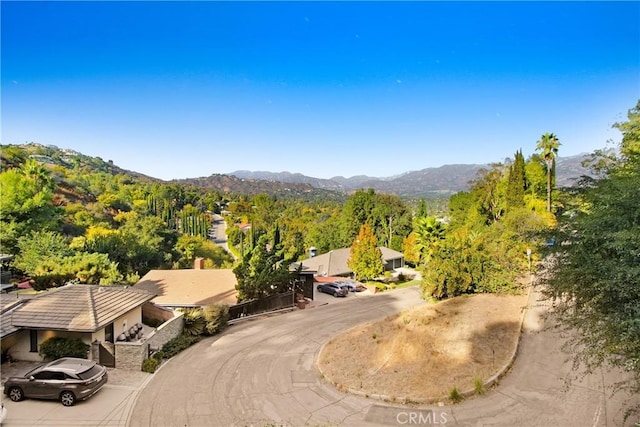 drone / aerial view featuring a mountain view