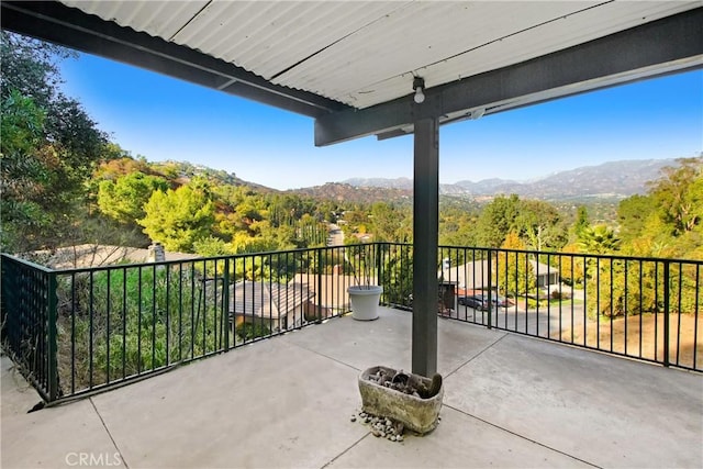 balcony featuring a mountain view