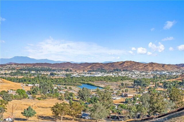 view of mountain feature featuring a water view