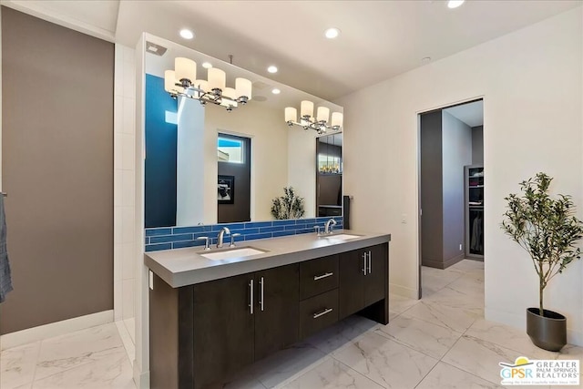 bathroom with backsplash and vanity