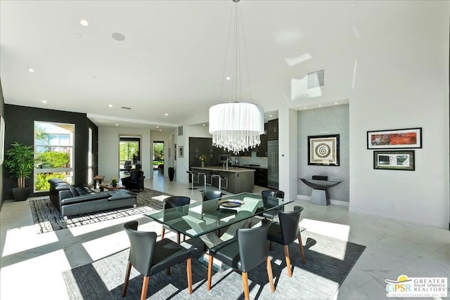 dining room featuring a notable chandelier