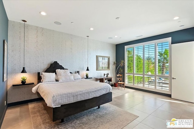 bedroom featuring light tile patterned floors