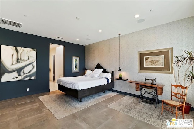 bedroom featuring concrete flooring