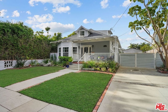 bungalow-style house featuring a front yard