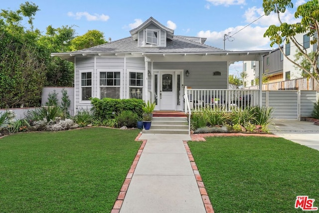 bungalow with a front yard