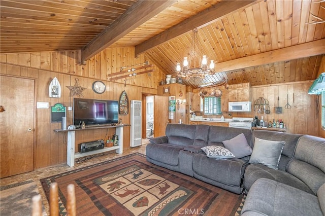 living room with wood ceiling, wooden walls, lofted ceiling with beams, and an inviting chandelier