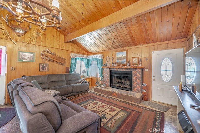 living room featuring wood walls, vaulted ceiling with beams, a healthy amount of sunlight, and wooden ceiling