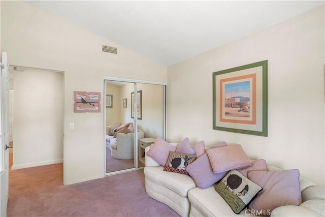 living room with light carpet and lofted ceiling