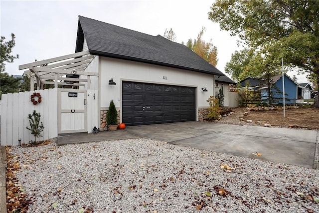 view of property exterior featuring a garage