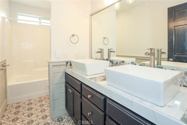 bathroom with vanity, tile patterned flooring, and shower / bathtub combination