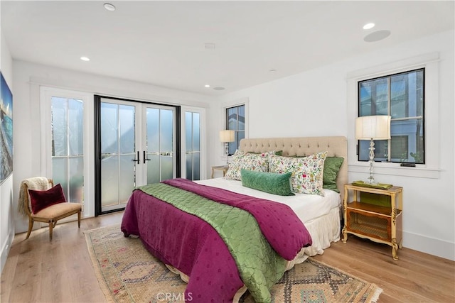 337 Holmwood Dr, Newport Beach, CA 92663 - bedroom featuring access to exterior, wood finished floors, recessed lighting, and french doors