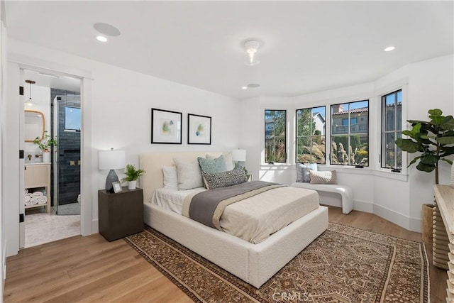 bedroom featuring wood-type flooring