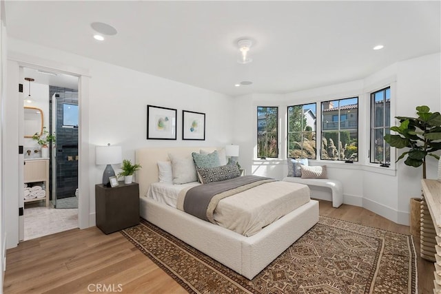 337 Holmwood Dr, Newport Beach, CA 92663 - bedroom with light wood-style flooring and recessed lighting