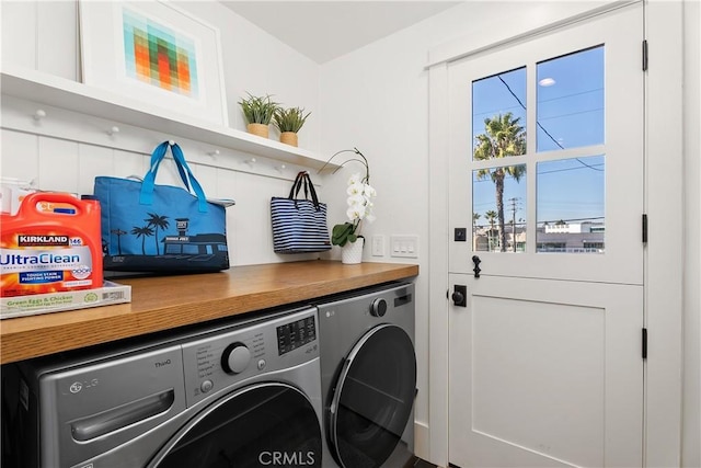 laundry room with washer and dryer