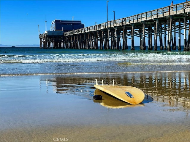 337 Holmwood Dr, Newport Beach, CA 92663 - dock area featuring a water view and a pier