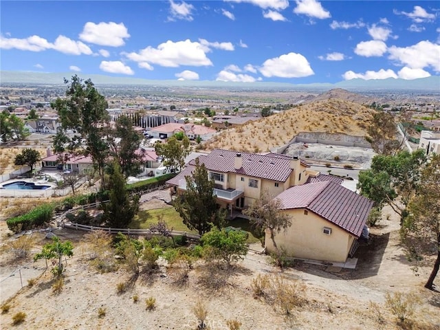 drone / aerial view featuring a mountain view