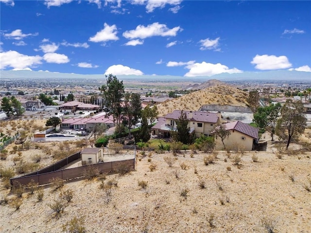 drone / aerial view featuring a mountain view