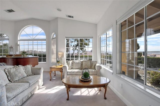 sunroom with vaulted ceiling