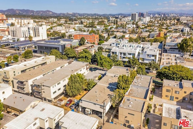 drone / aerial view featuring a mountain view