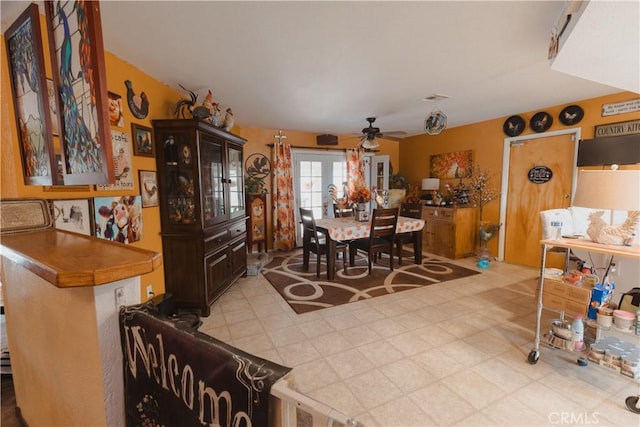 dining room featuring ceiling fan