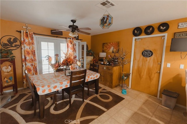 dining room featuring ceiling fan