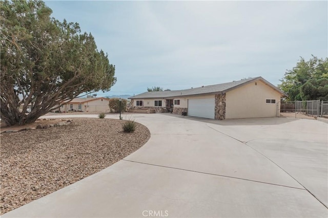 single story home with a garage