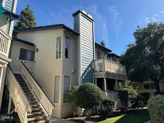 view of property exterior featuring a balcony