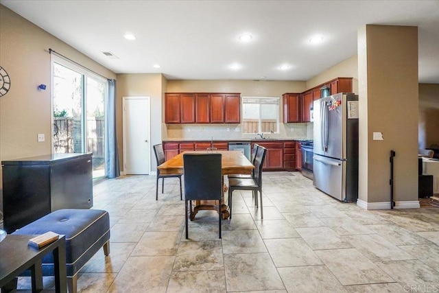 31616 Umbria Ln, Winchester, CA 92596 - kitchen with a healthy amount of sunlight, visible vents, appliances with stainless steel finishes, and a sink