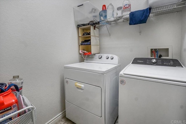 31616 Umbria Ln, Winchester, CA 92596 - laundry room featuring a textured wall, laundry area, and washer and clothes dryer