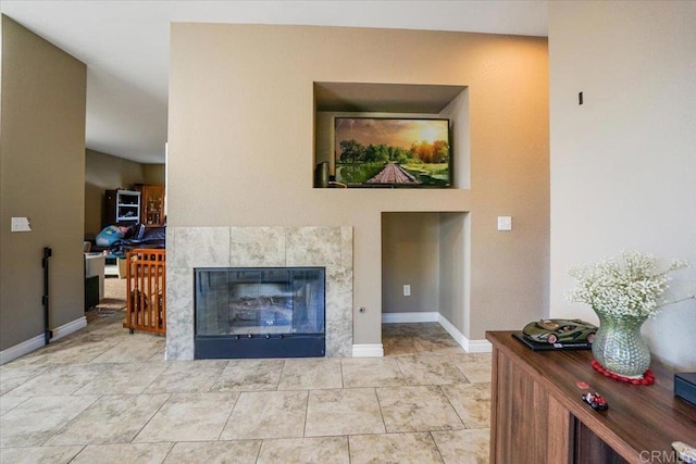 31616 Umbria Ln, Winchester, CA 92596 - living room featuring a tiled fireplace and baseboards