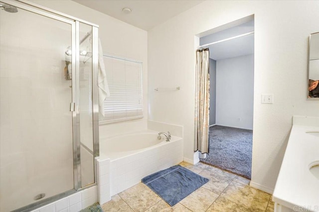 31616 Umbria Ln, Winchester, CA 92596 - bathroom with tile patterned flooring, a garden tub, a shower stall, and double vanity