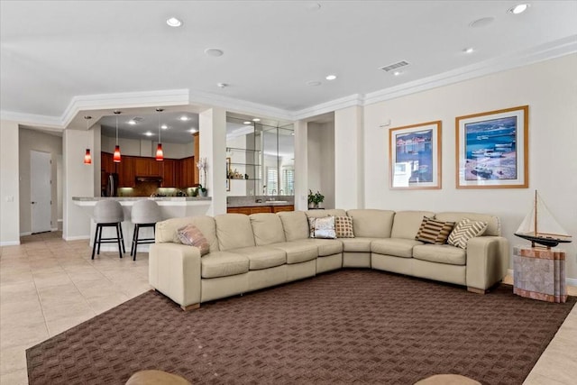 tiled living room featuring ornamental molding