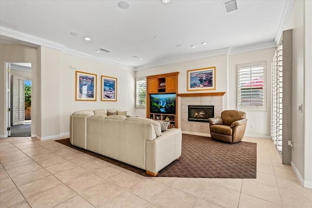 living room featuring crown molding and light tile patterned flooring