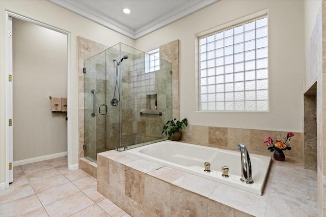 bathroom with separate shower and tub and tile patterned floors