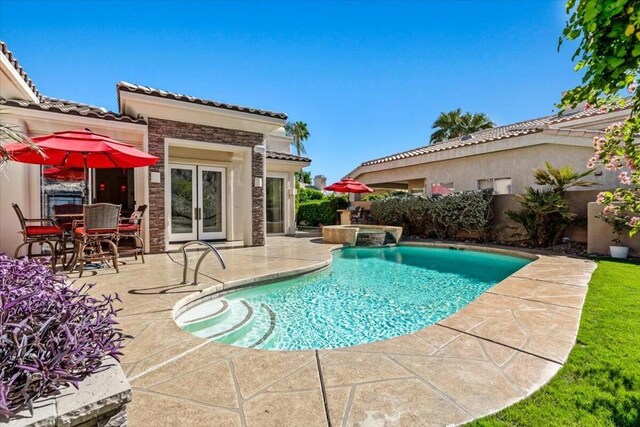 view of pool with a patio